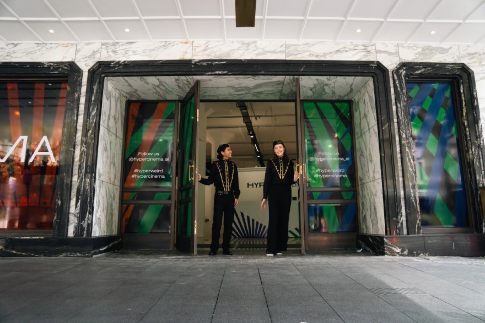 The HyperCinema entrance in Auckland, with staff at the doors